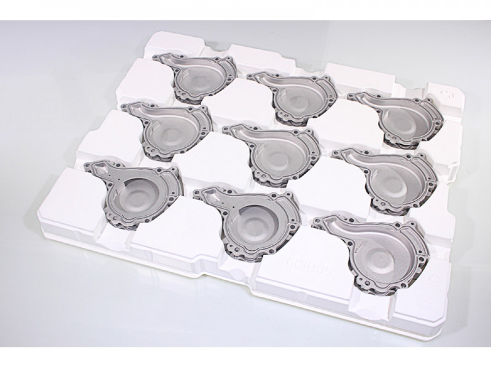 Shaped trays for the automotive industry